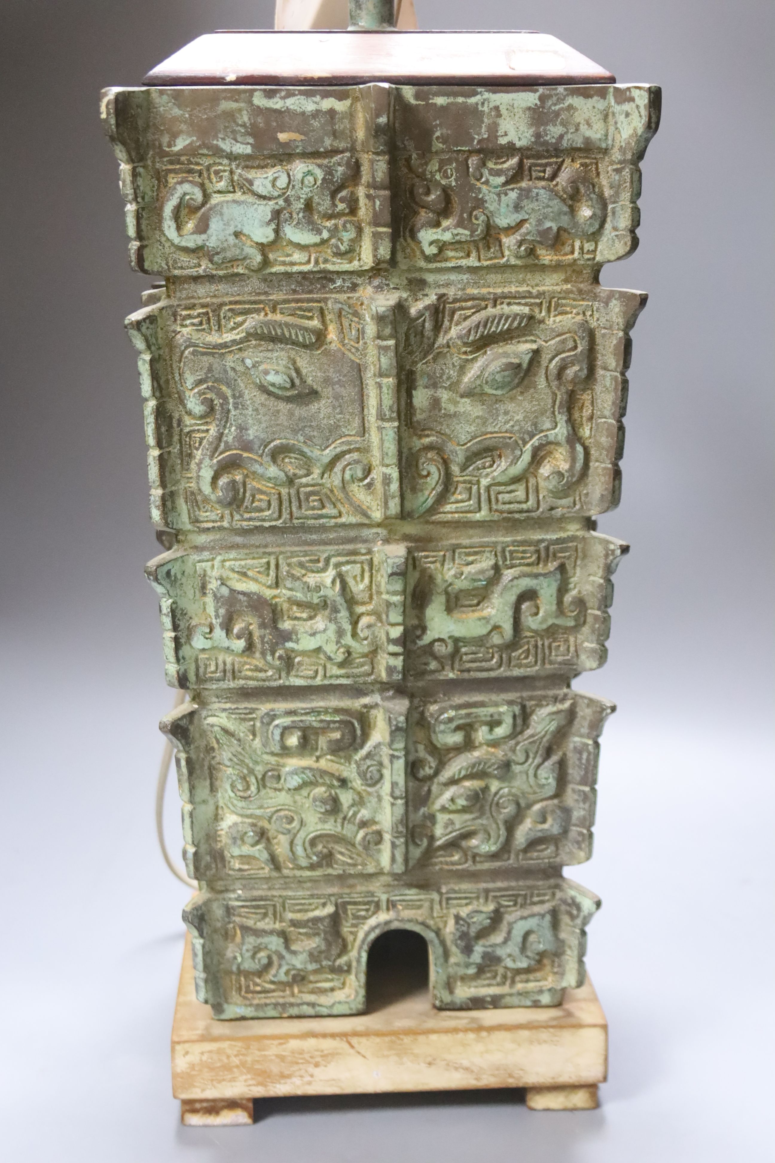 A Chinese archaistic cast vase, now as a lamp and a Chinese ceramic table lamp, tallest 38cm